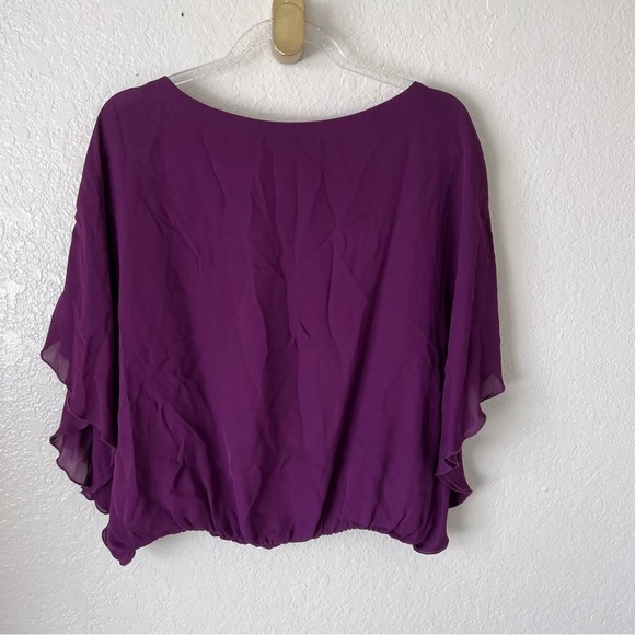 Alice and Olivia purple flutter sleeve silk top size small - Picture 11 of 13